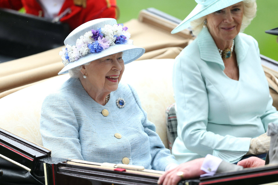 Upon her Platinum Jubilee, Queen Elizabeth II (l.) has officially announced that Camilla Duchess of Cornwall (r.) should "be known as Queen Consort."
