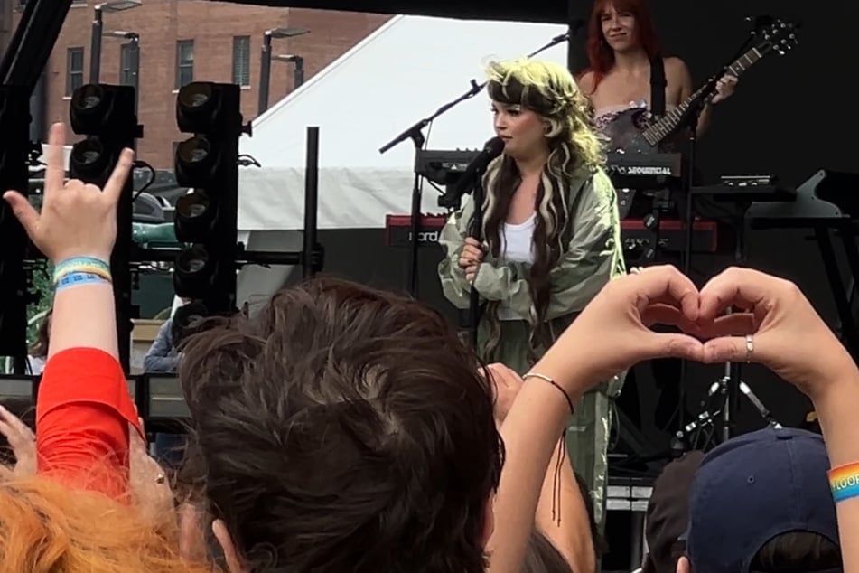 Lola Young opened up about having a "tricky" past few days before collapsing later in the set.