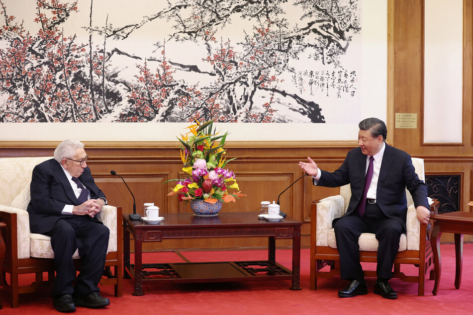 Chinese President Xi Jinping and Henry Kissinger, former US secretary of state, attend a meeting at the Diaoyutai State Guesthouse in Beijing, China.