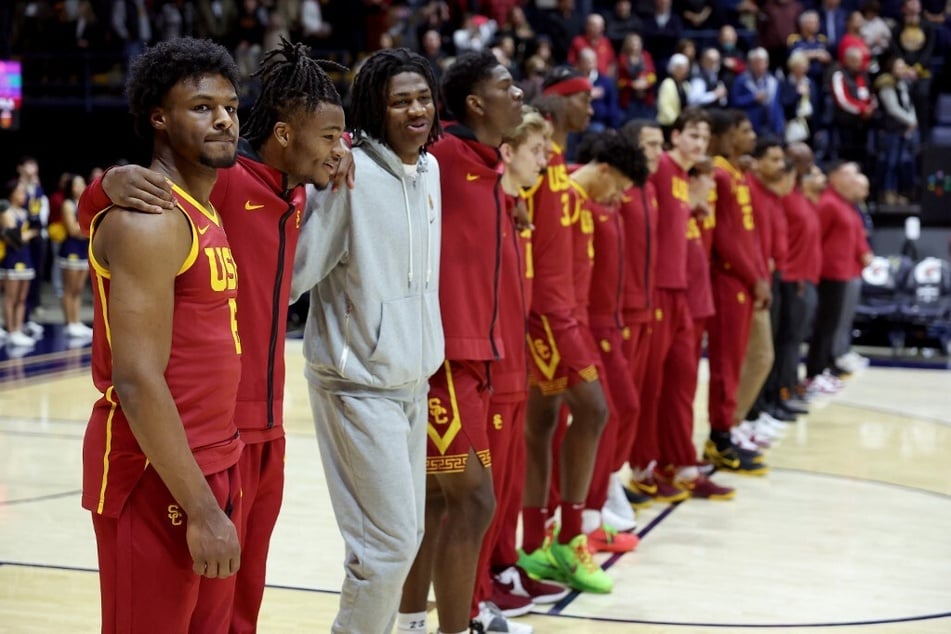 While Coach Enfield's departure could negatively impact USC's basketball program, staying in Los Angeles could benefit Bronny James (far l.)