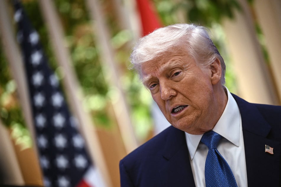 US President Donald Trump (pictured) said Saturday he would speak by phone with Russian President Vladimir Putin to end the "bloodbath" in Ukraine.