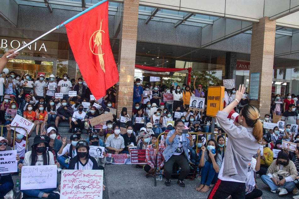 Yangon, Myanmar: a protester uses a megaphone to address other demonstrators against the military coup.