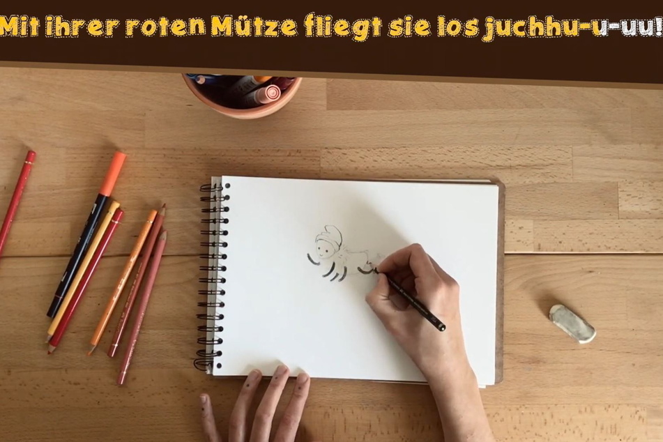 Biene Millie entsteht. Ist sie fertig, trägt sie gern ein rotes Mützchen.