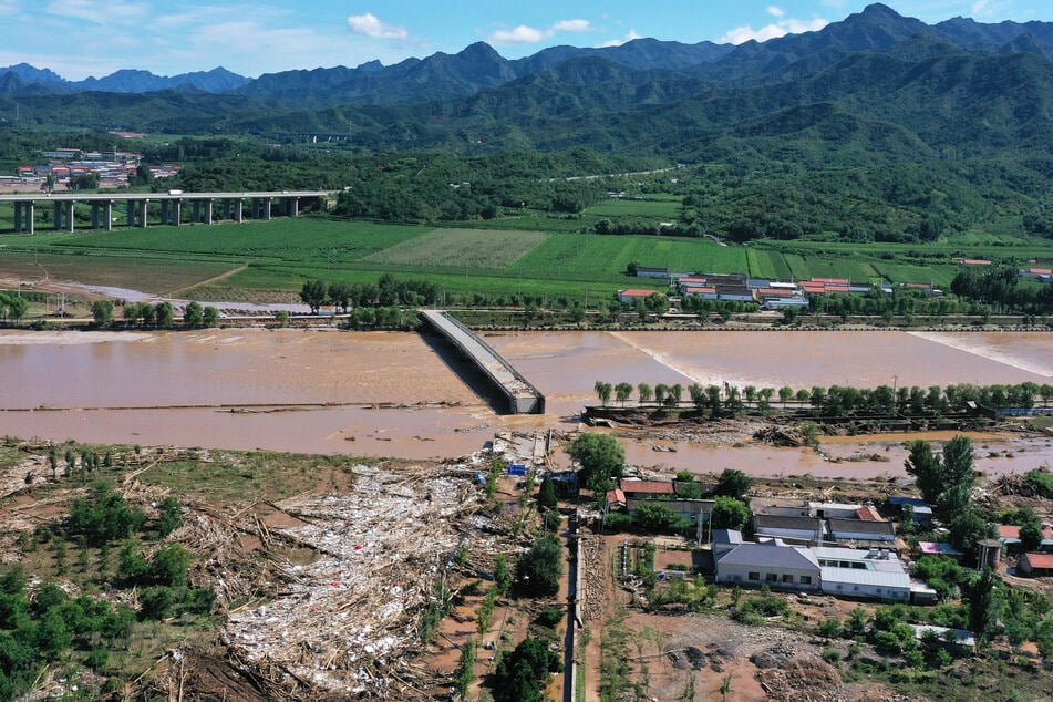 An aerial picture shows a flooded area in Miyun district, northern Beijing, on July 29, 2025, following heavy rains.