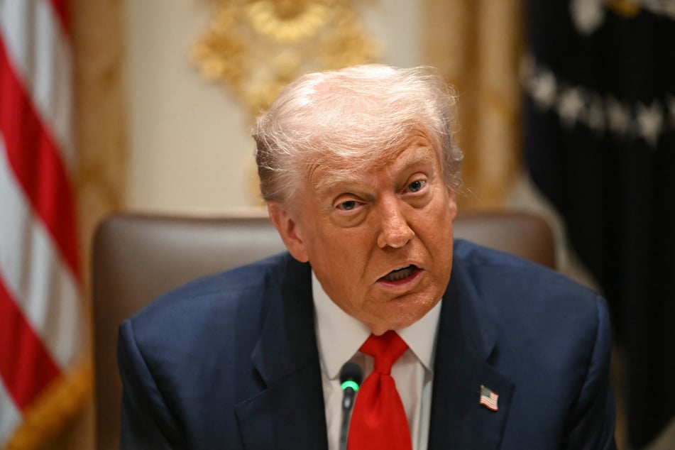 President Donald Trump slammed Beijing for halting American soybean purchases and threatened to stop buying cooking oil from China.