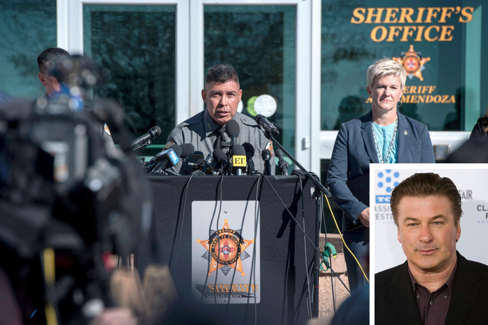 Santa Fe County Sheriff Adan Mendoza (c.) and Santa Fe District Attorney Mary Carmack-Altwies (r.) held a news conference to discuss the ongoing investigation of the on-set shooting by actor Alec Baldwin (inset). Baldwin's first interview on the incident will air this Thursday.