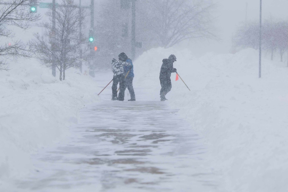 Blizzard conditions hit Des Moines, Iowa on Friday.