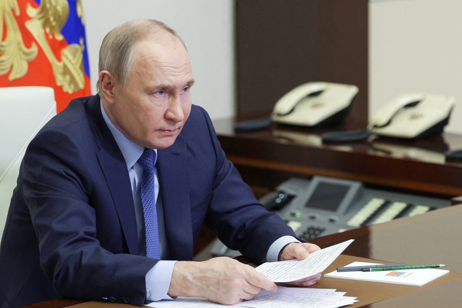 The day after sending troops into Ukraine, Russian President Vladimir Putin (pictured) gave an address to the nation in which he urged the Ukrainian army to overthrow Zelensky.