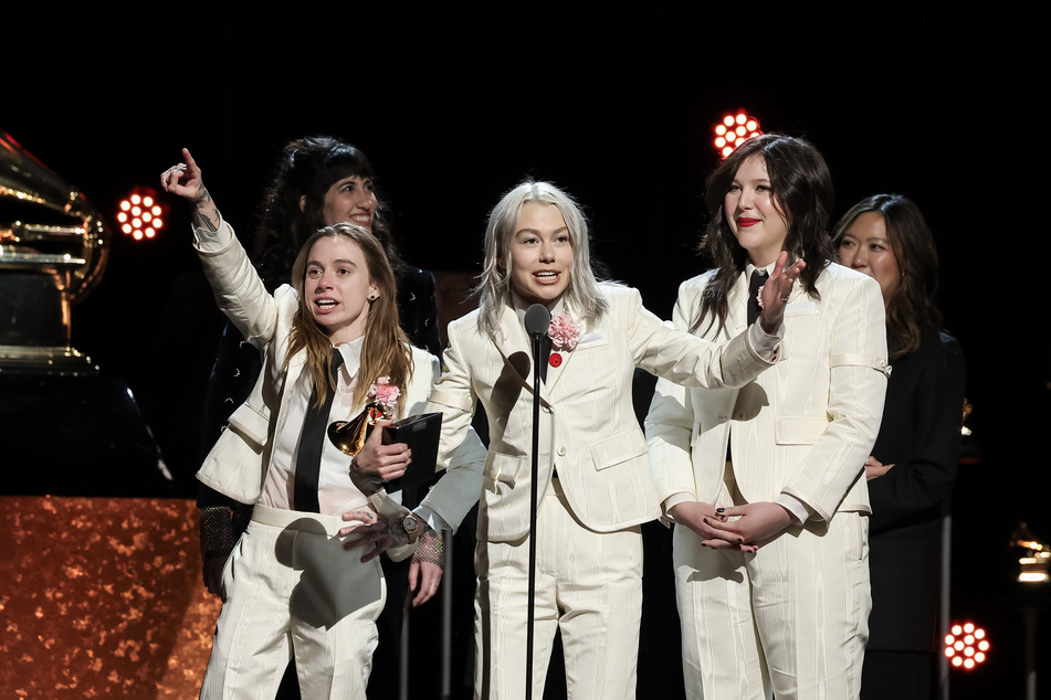Phoebe Bridgers, Lucy Dacus, and Julien Baker of boygenius accept the Best Rock Performance award for Not Strong Enough onstage during the 66th Grammy Awards on February 4, 2024, in Los Angeles, California.