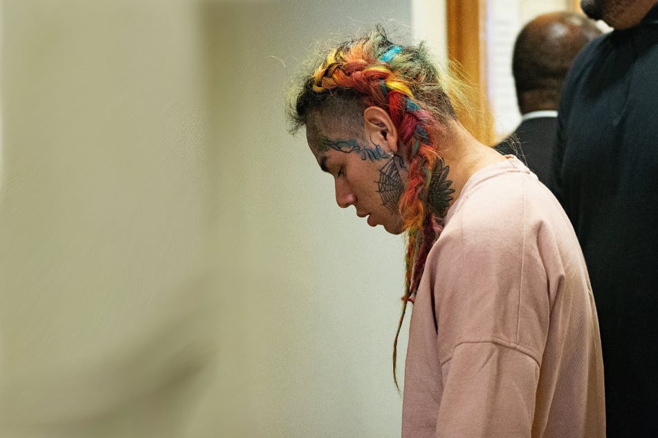 Controversial rapper Tekashi 6ix9ine was reportedly hospitalized on Tuesday after a group of men brutally assaulted him in the bathroom of a gym.