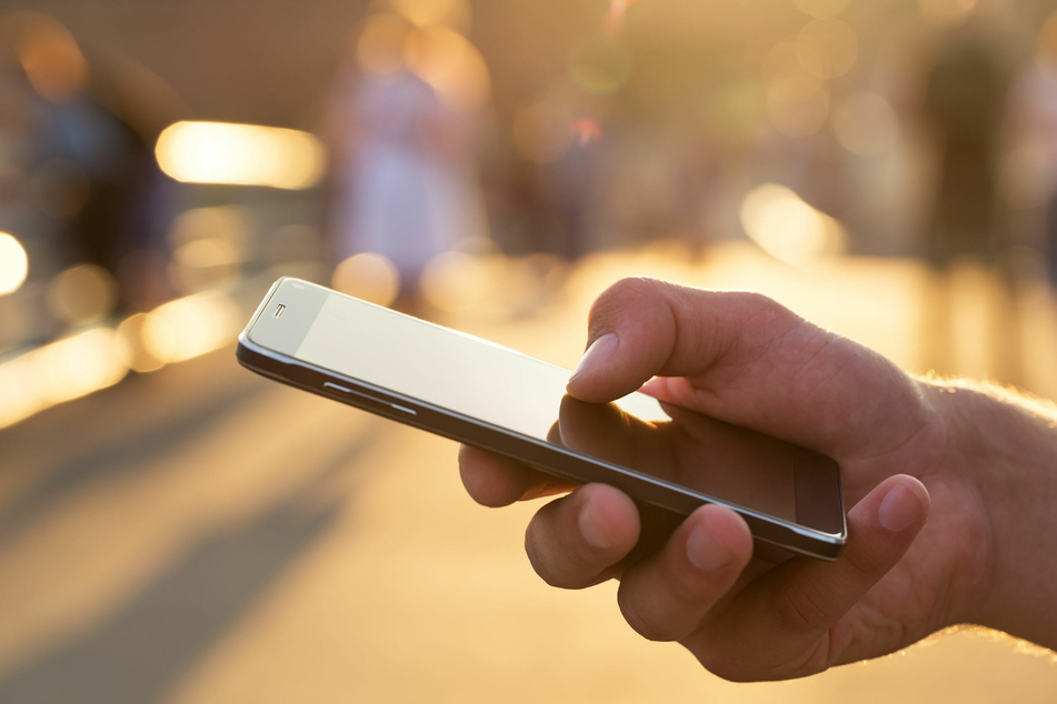 Being out in public with your eyes on your smartphone can be very dangerous (stock image).