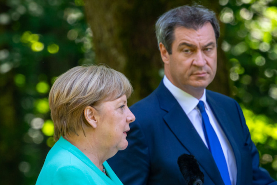 Markus Söder (CSU), Ministerpräsident von Bayern, und Bundeskanzlerin Angela Merkel (CDU) bei einer Pressekonferenz.
