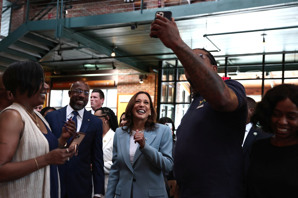 Vice President Kamala Harris stops at Paschal's restaurant along with Georgia Senator Raphael Warnock before a campaign event in Atlanta.