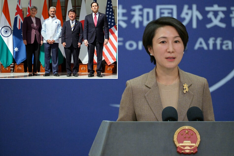 Chinese foreign ministry spokesperson Mao Ning (r.) issued a defiant statement after ministers from the US, India, Japan, and Australia met this week.