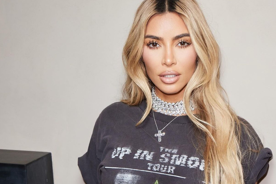 Kim Kardashian poked fun at the recent royal drama as she flaunted her latest fashion.