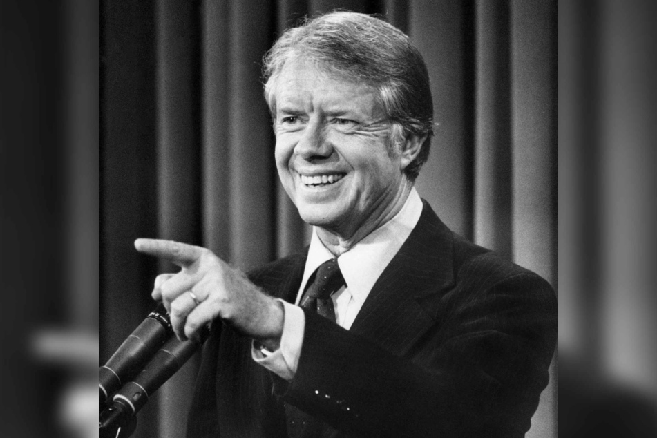 US President Jimmy Carter answers journalist questions in Washington DC on September 29, 1977 during the bi-monthly press conference.