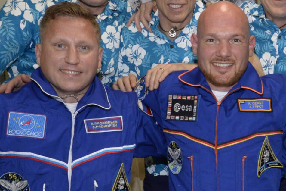 Der russische Kosmonaut Sergej Prokopjew und der deutsche Astronaut Alexander Gerst.