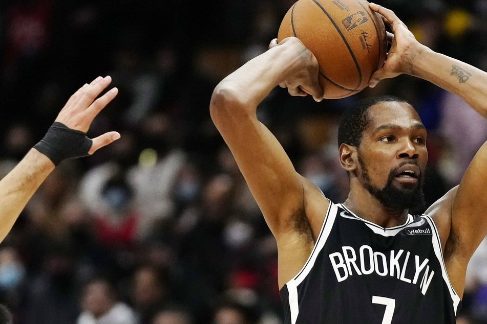 Kevin Durant helped the Nets snap a five-game home skid against the Spurs.