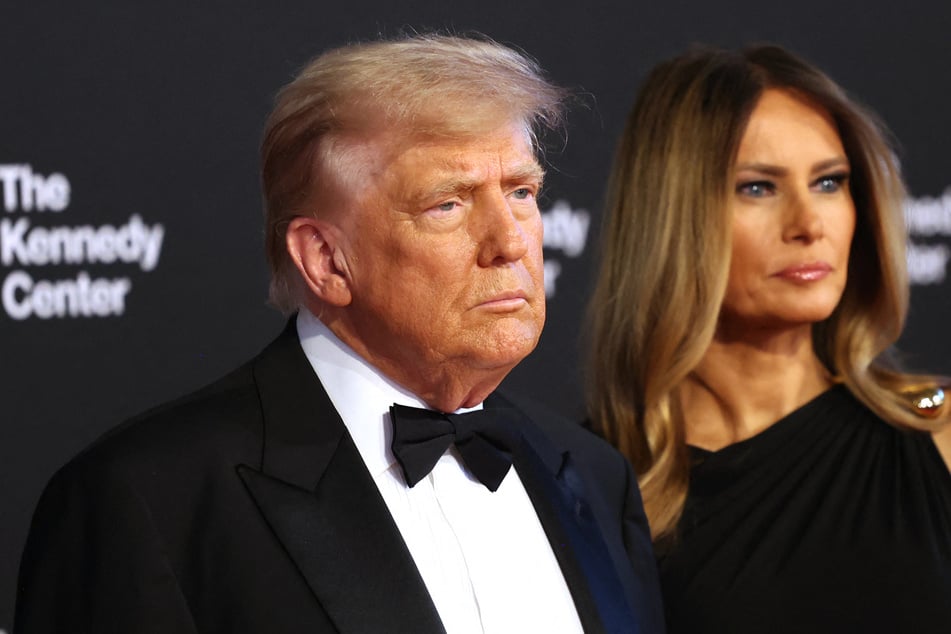 Donald and Melania (r.) Trump attended Wednesday's performance of Les Misérables at the Kennedy Center as protests against his administration continued across the US.