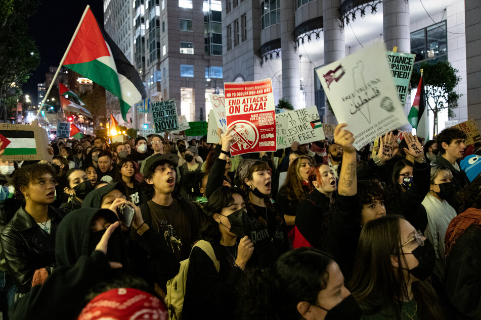 Protesters marching in support of Palestinians fill an intersection near where Biden was holding a fundraiser while in town for the Asia-Pacific Economic Cooperation (APEC) summit in San Francisco, on November 14, 2023.