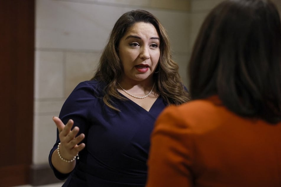 Delia Ramirez speaks with reporters during a break in an orientation meeting in the US Capitol Building.
