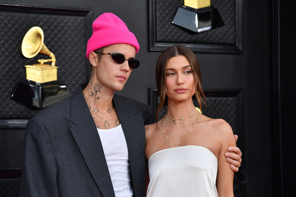 Justin Bieber (l.) and Hailey Bieber (r.) were spotted enjoying some alone time in Hawaii amid rumors that the spouses are facing martial trouble.