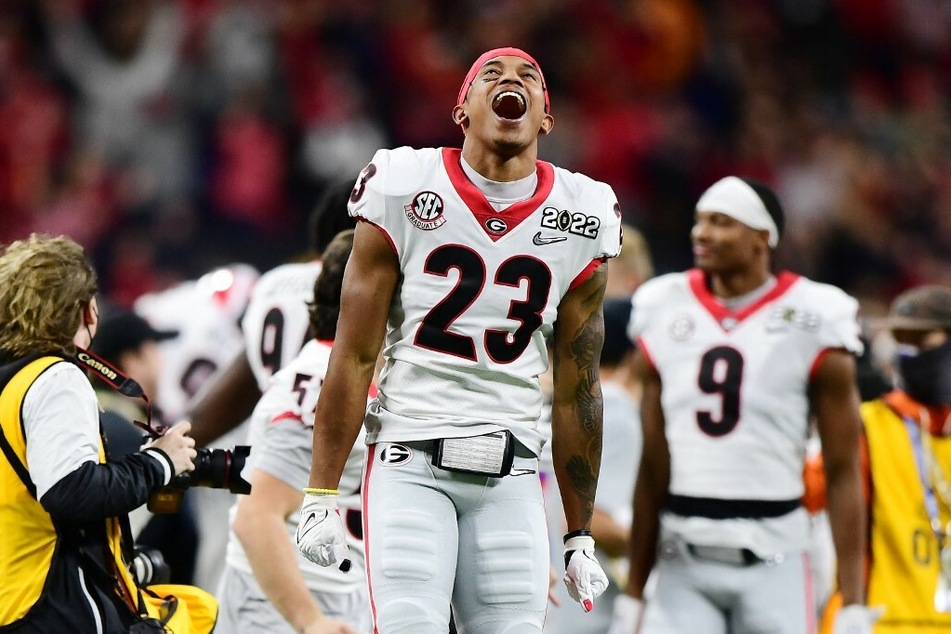 Tykee Smith of the Georgia Bulldogs celebrated after defeating the Alabama Crimson Tide during the 2022 National Championship game under Coach Smart's leadership.