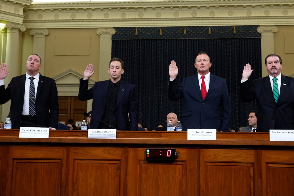 (From l. to r.) Sgt. Edward Lenz, Adams Township Police Department, Commander, Butler County Emergency Services Unit, Patrolman Drew Blasko, Butler Township Police Department, Lt. John Herold, Pennsylvania State Police; and Patrick Sullivan, former US Secret Service Agent, are sworn in during the first hearing of the Task Force on the Attempted Assassination of Donald Trump on Thursday.