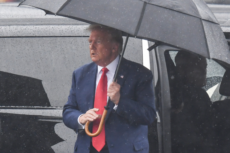 Donald Trump arrives at Ronald Reagan Washington National Airport on August 3, 2023, after his arraignment in court.