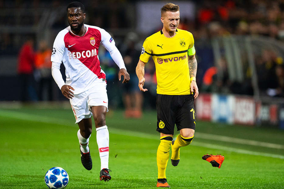Ups! BVB-Star Marco Reus (r.) verliert seinen Schuh, nachdem er von Monacos Jean-Eudes Aholou (l.) hart - aber fair - attackiert wurde.