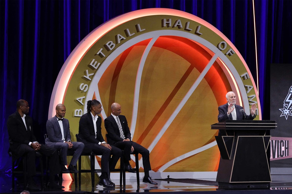 Hall of Fame members presenters (from l to r) David Robinson, Tony Parker, Tim Duncan, and Manu Ginobili looked on as inductee coach Gregg Popovich took the podium during the 2023 Naismith Basketball Hall of Fame Induction at Symphony Hall on Saturday.
