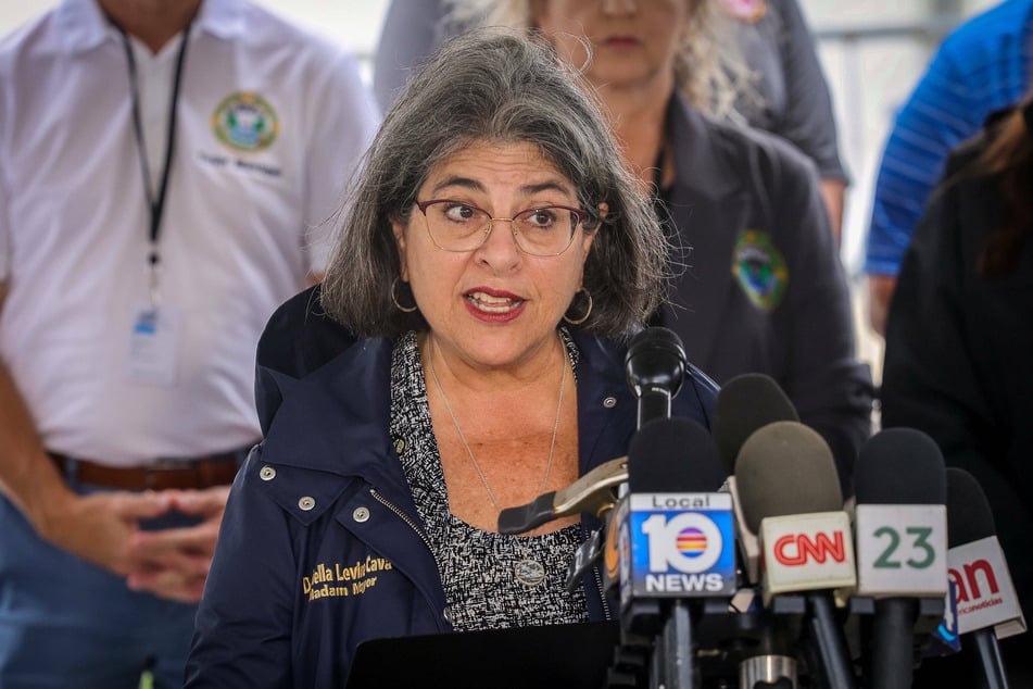 Miami-Dade County Mayor Daniella Levine Cava acknowledged that a lightning strike at around 1 AM put a brief pause on rescue efforts.
