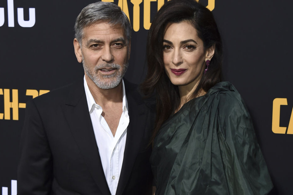 George (58) und Amal Clooney (42) gehören auch zu den Opfern von Sturm Dennis.