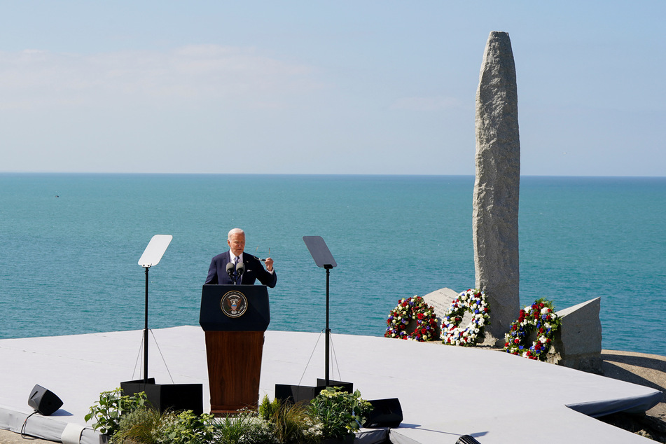 President Joe Biden delivers remarks at the World War II Pointe du Hoc Ranger Monument following the 80th anniversary of the 1944 D-Day landings.