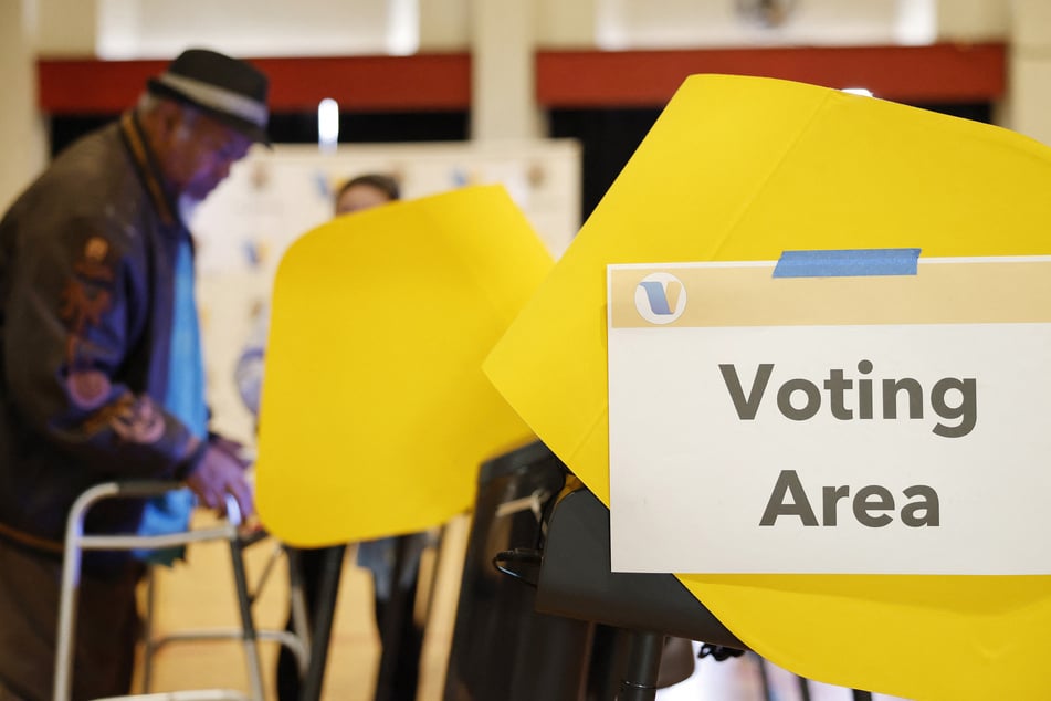 A person votes at a polling station at First United Methodist Church in Pasadena, California, on November 4, 2025.