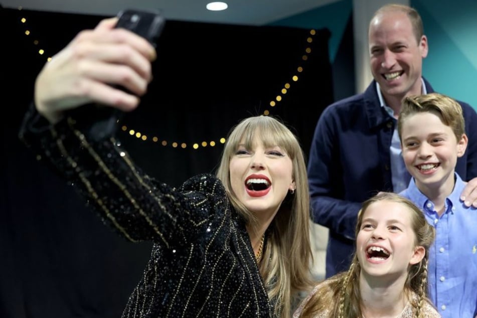 Taylor Swift (34) with Prince William (42), Princess Charlotte (9) and Prince George (11) before an "Eras Tour" concert in London.