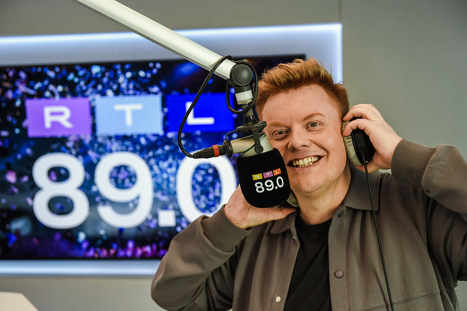 "89.0 RTL"-Moderator BigNick freut sich auf seine neue Show. Ab sofort versüßt er allen Hörern den Nachmittag.
