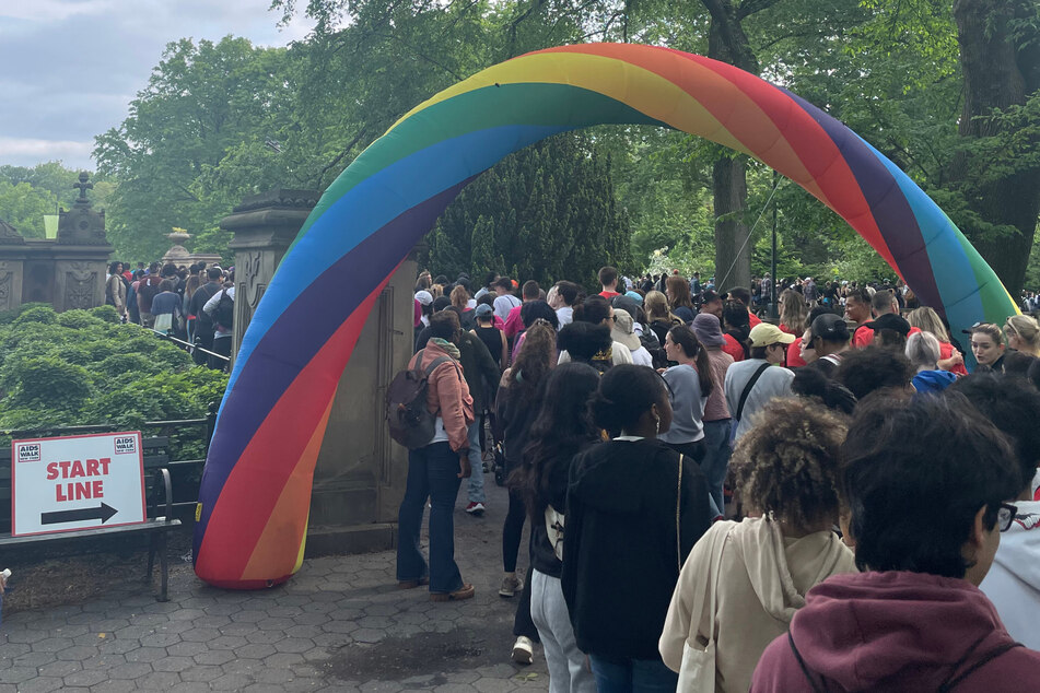 Walkers started the race by passing under a rainbow archway at the end of The Mall in New York City's Central Park.