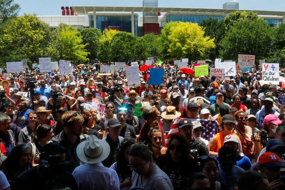 Hundreds protest against gun laws near the NRA annual convention in Houston, Texas.