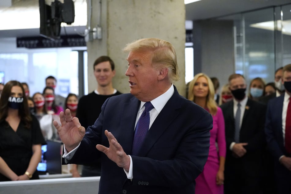 President Donald Trump speaks to the press at the RNC offices in Arlington, Virginia.