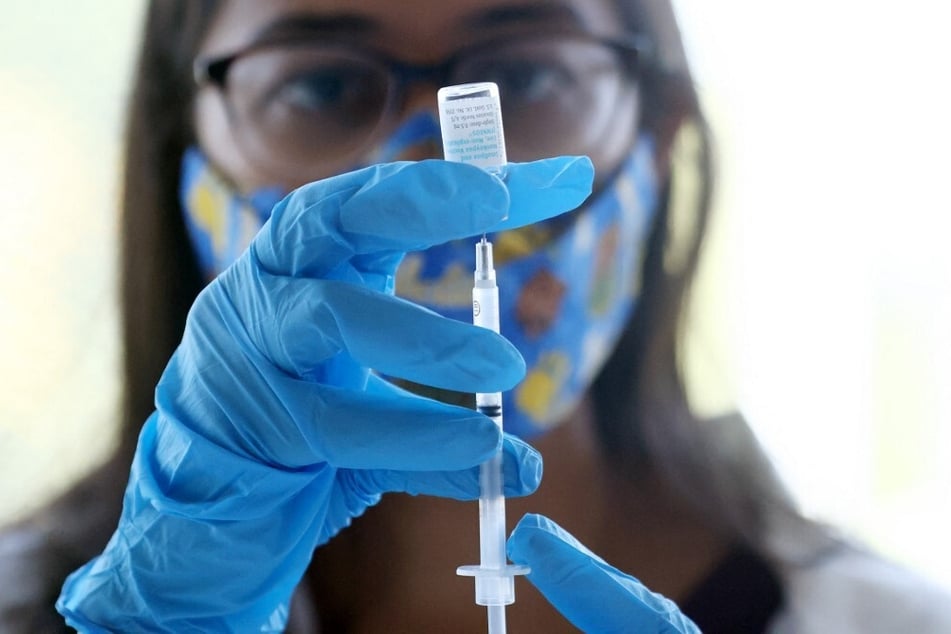 A pharmacist prepares a dose of the Jynneos monkeypox vaccine at a pop-up vaccination clinic in Los Angeles.