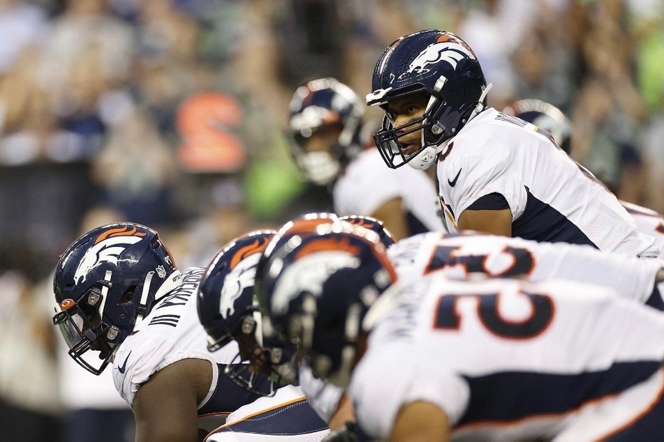 Russell Wilson of the Denver Broncos prepares for a snap against the Seattle Seahawks during the fourth quarter.