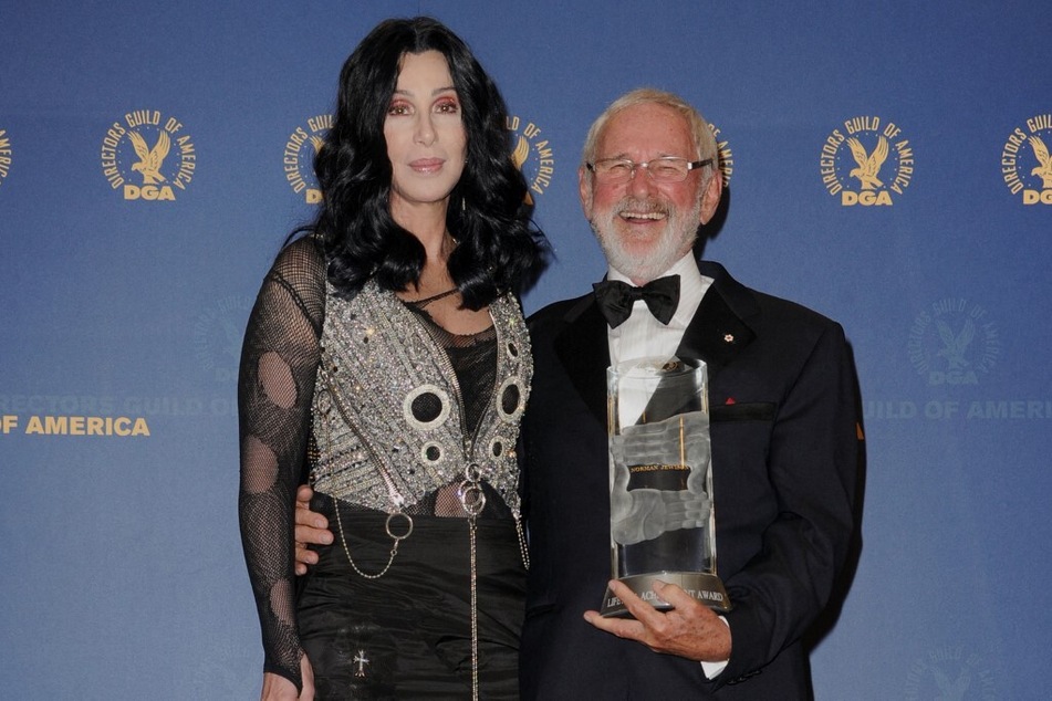 Norman Jewison, winner of the Lifetime Achievment Award, poses in the press room with singer Cher during the 62nd Annual Directors Guild Of America Awards on January 30, 2010.
