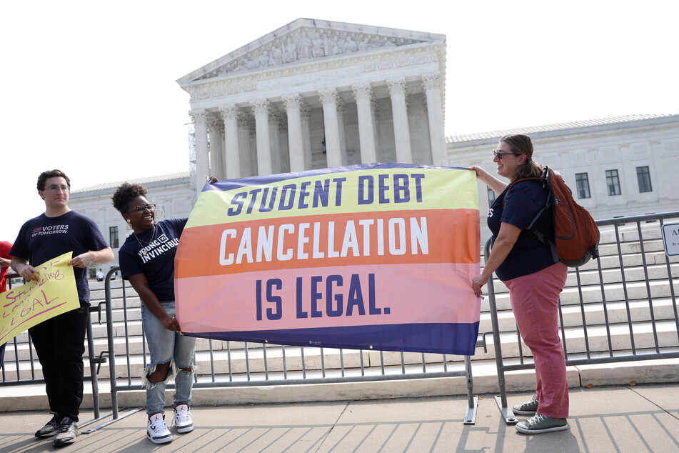 Advocates for student loan forgiveness gather outside the Supreme Court on Friday, June 30, 2023.