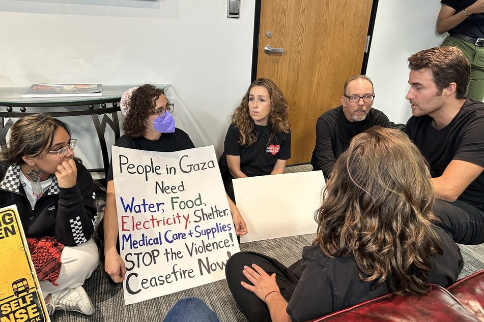 Ten people were arrested during the peaceful sit-in in Senator Mark Kelly's office.