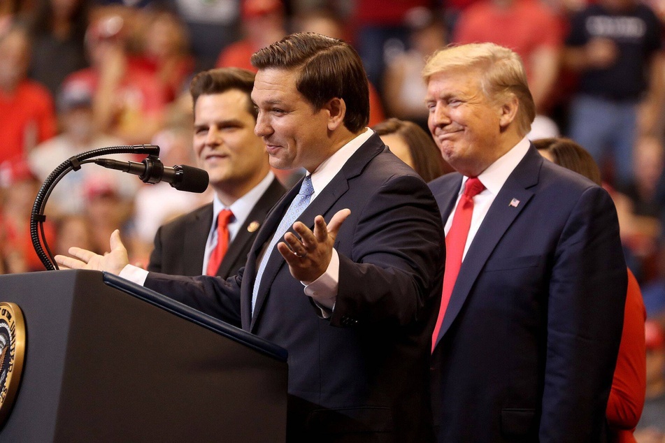 Then-president Donald Trump joined on the podium by Florida gov. Ron DeSantis and Rep. Matt Gaetz during a rally in Sunrise, Florida, in 2019.