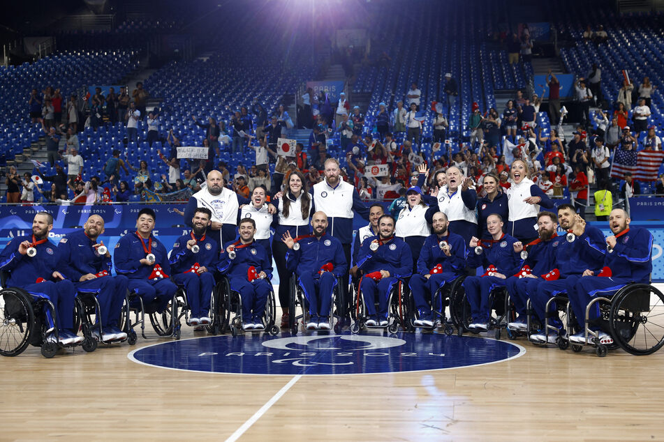 Silver medalists of Team USA pose during the medal ceremony for wheelchair rugby at the Paris Paralympics.