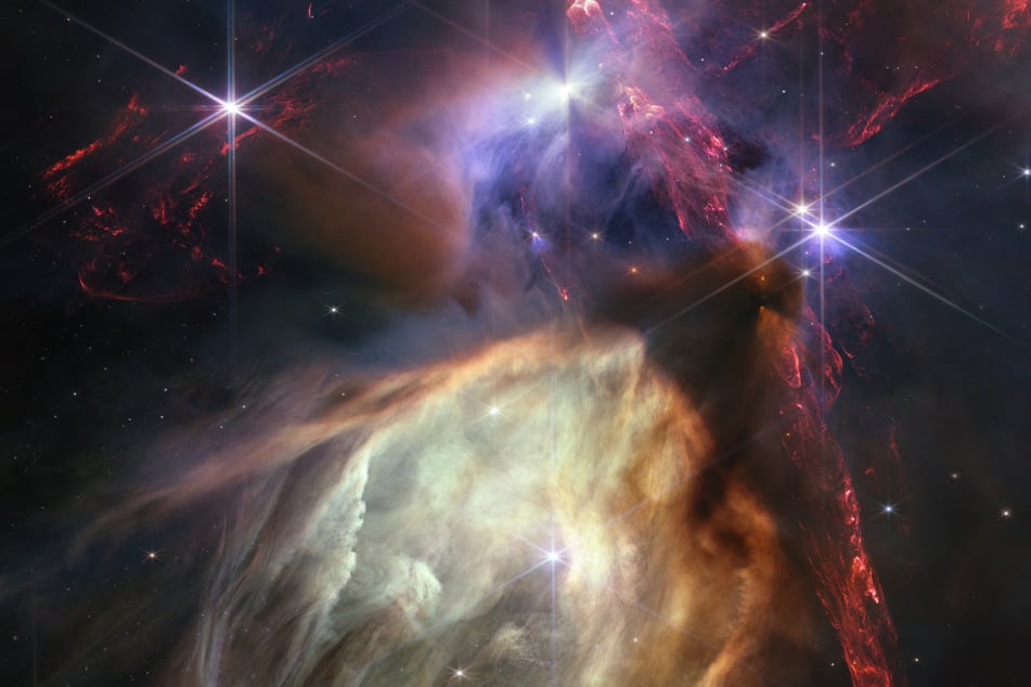 This NASA handout image captured by the James Webb telescope and obtained on July 12, 2023, shows a small star-forming region in the Rho Ophiuchi cloud complex, the closest star-forming region to Earth.