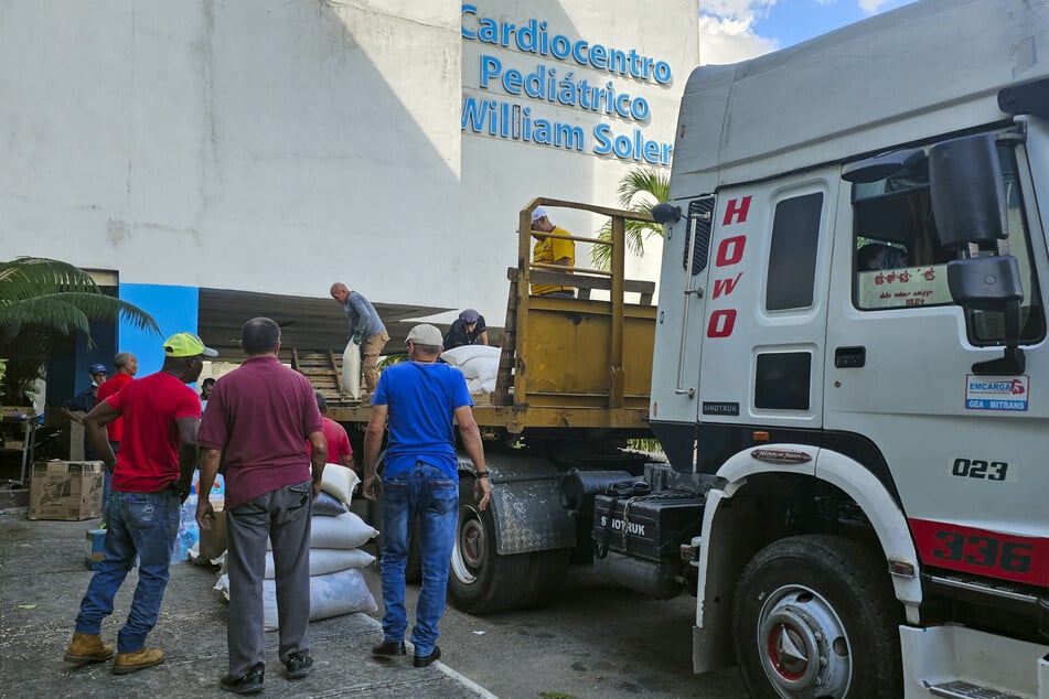 Aid brought by the Nuestra América Convoy from Mexico is unloaded at the William Soler Pediatric Cardiocenter in Havana, Cuba, on March 24, 2026.