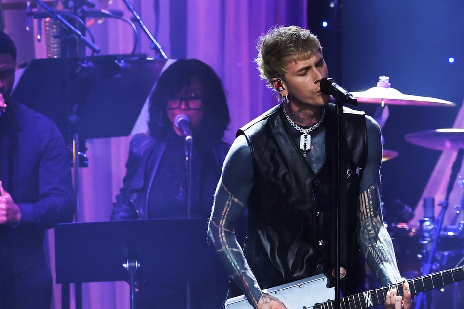 MGK hosts bizarre Instagram live where he gets nipple piercing before concert